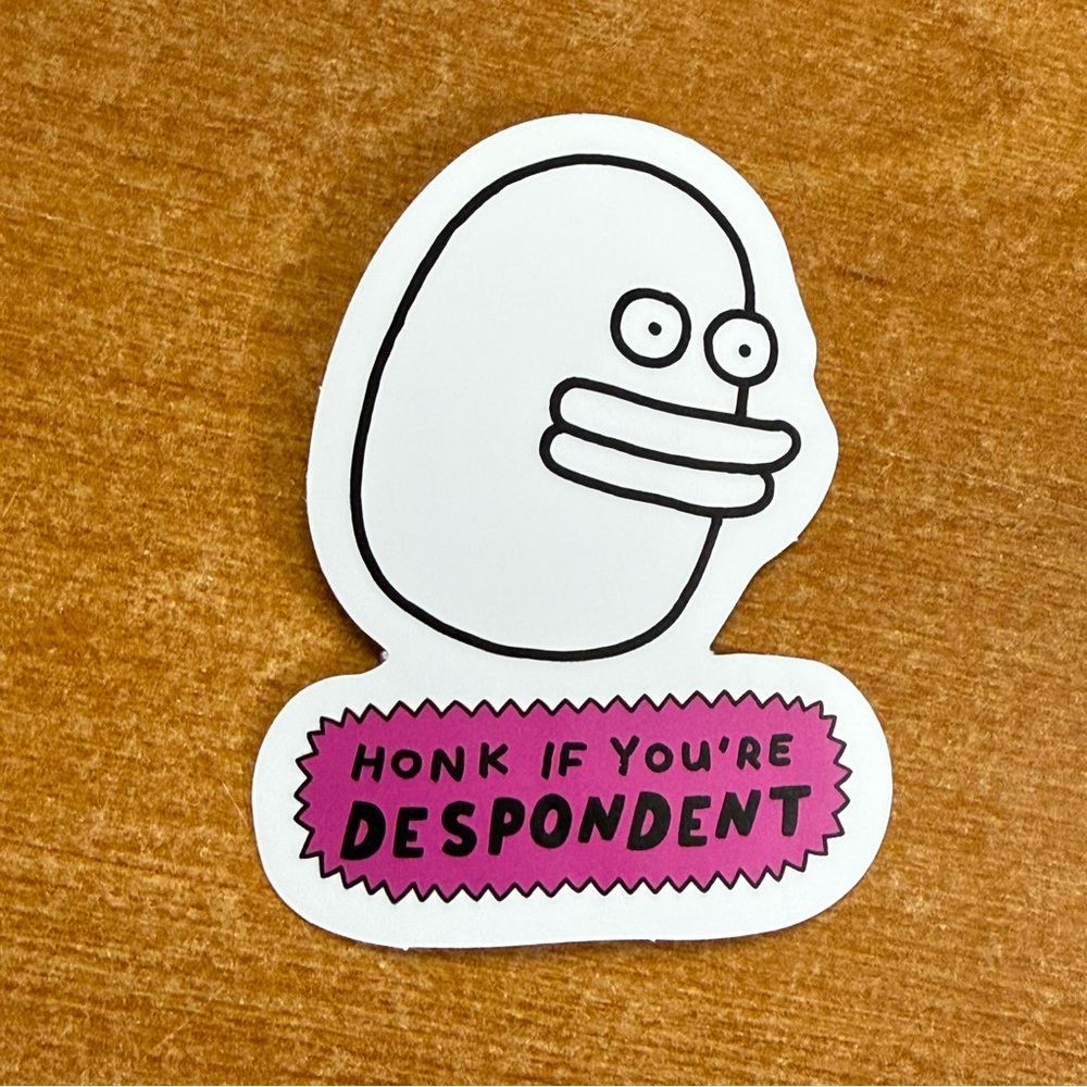 Cartoon Sticker with Pink and‎ White Design